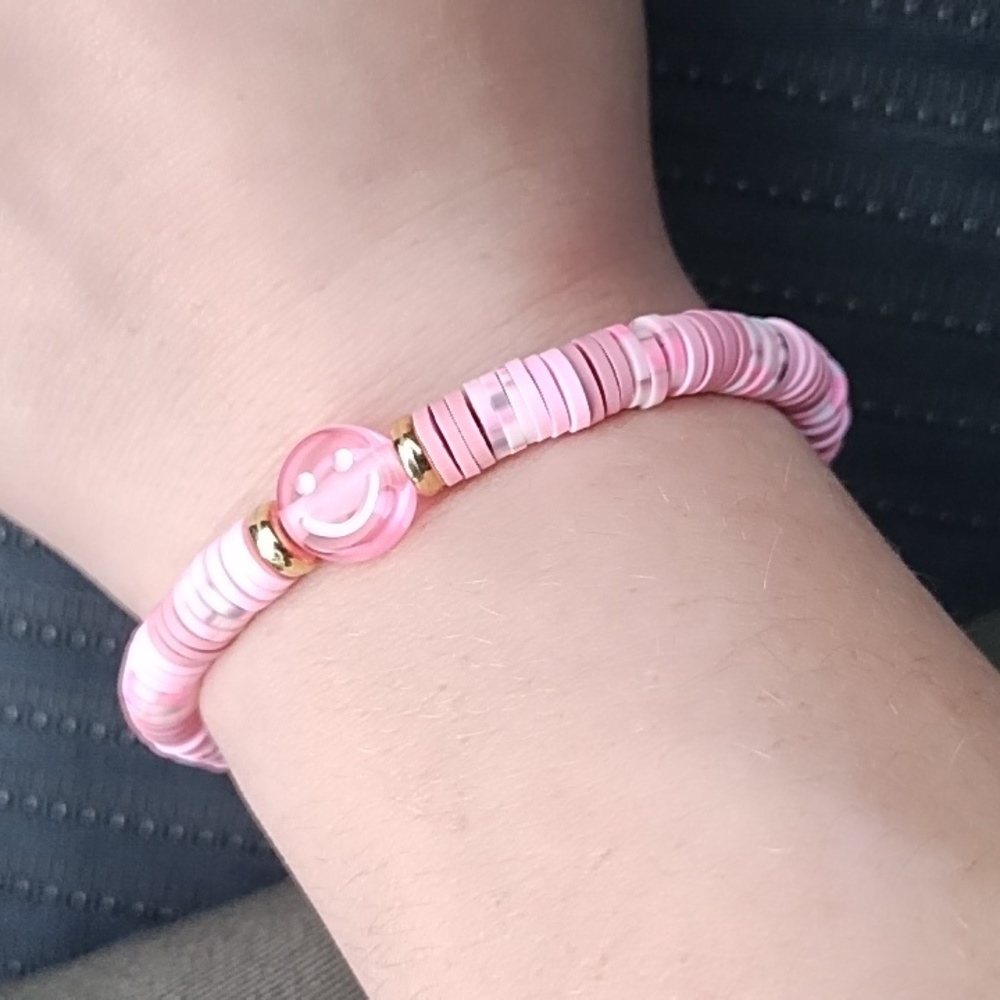 pink smiley face clay bead bracelet